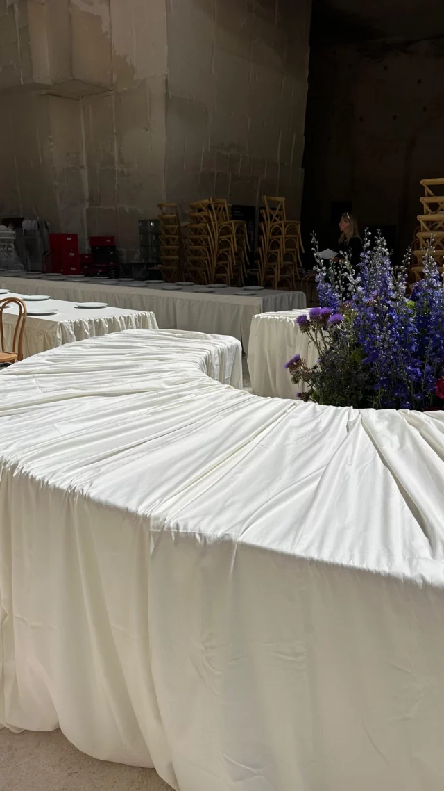 TEXTILE & ARCHITECTUREOver 200 meters of fabric.Repeated gestures, time and precision.Draping, pleating, adjusting, shaping volumes and lines to create a dialogue with the monumental architecture.A textile installation in collaboration with @apollonialinen at @carrieresdeslumieresWedding planning by @mrssmithweddingsSlow luxury . Architecture . Textile Art